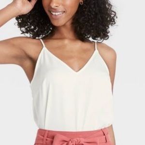 a new day white tank